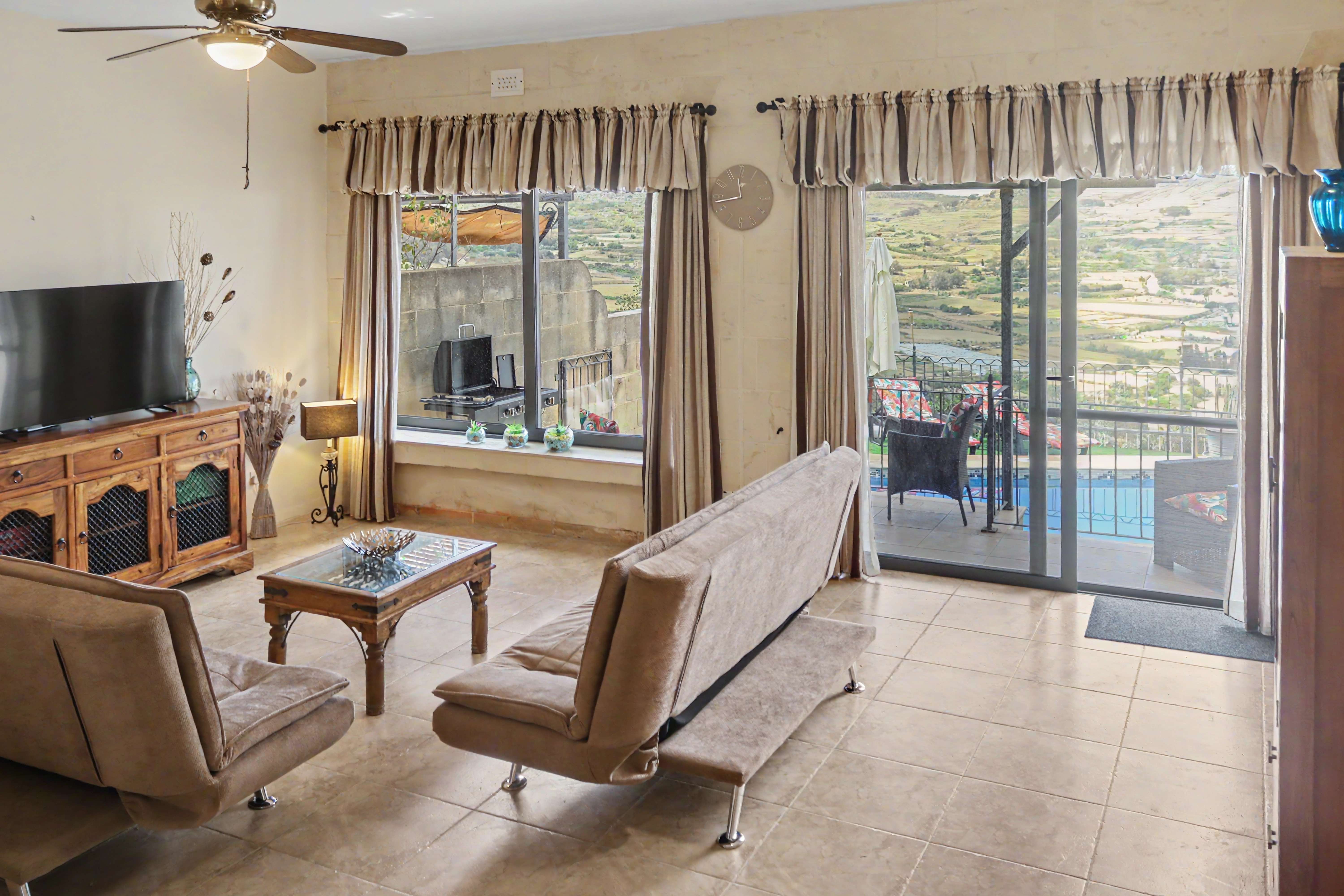 Living room with pool view