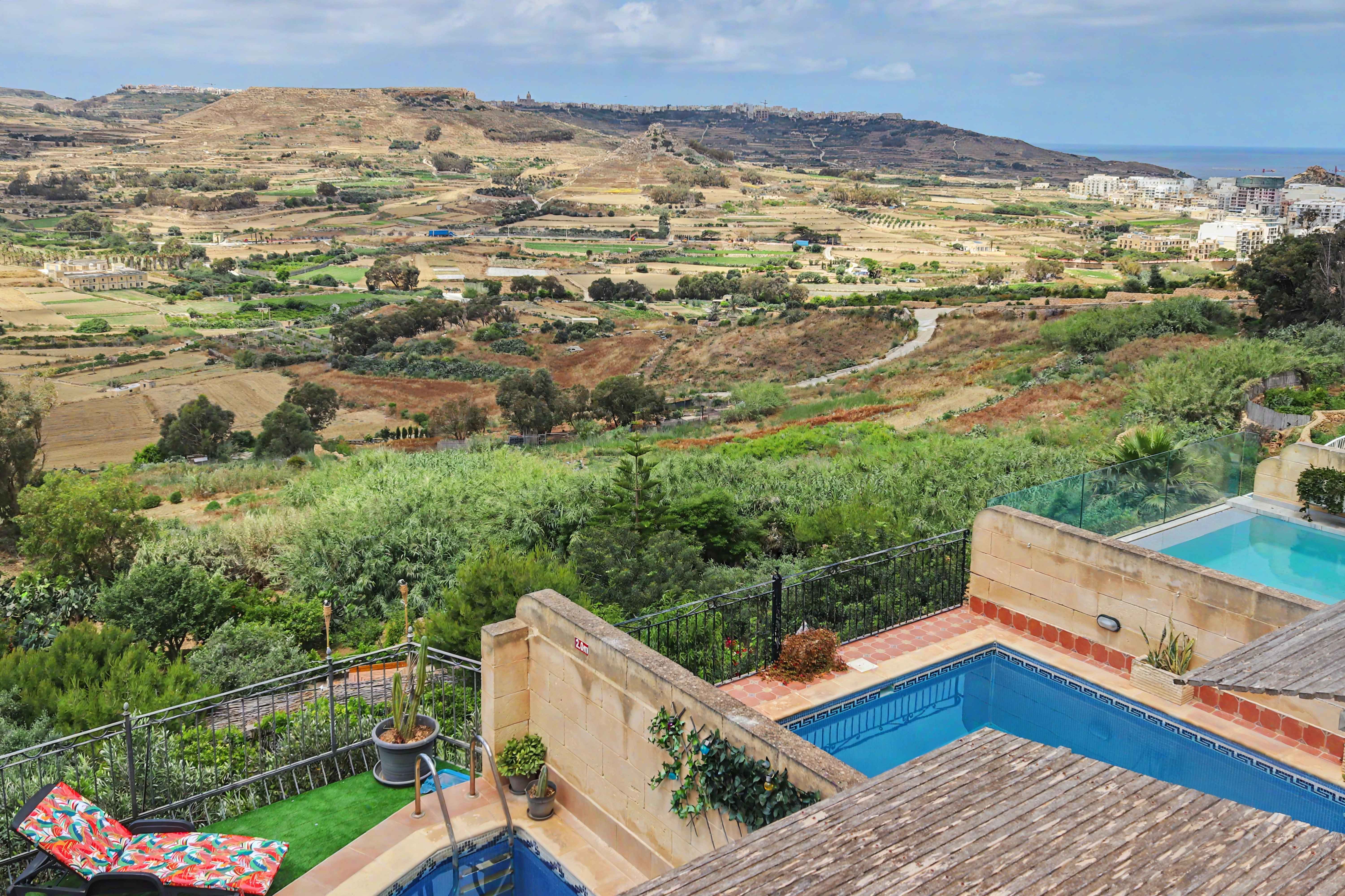 Pools with panoramic valley view