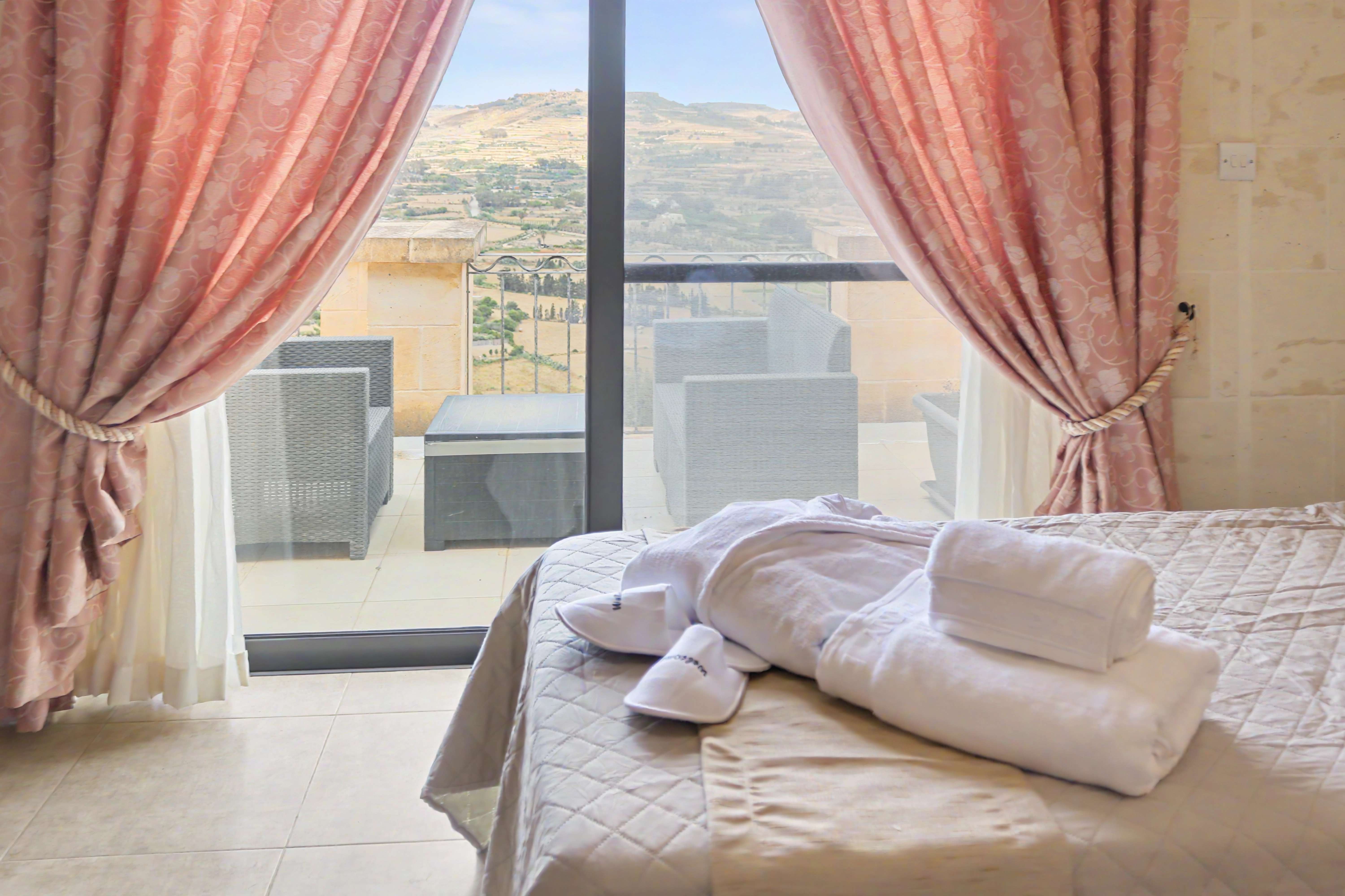 Bedroom with terrace view