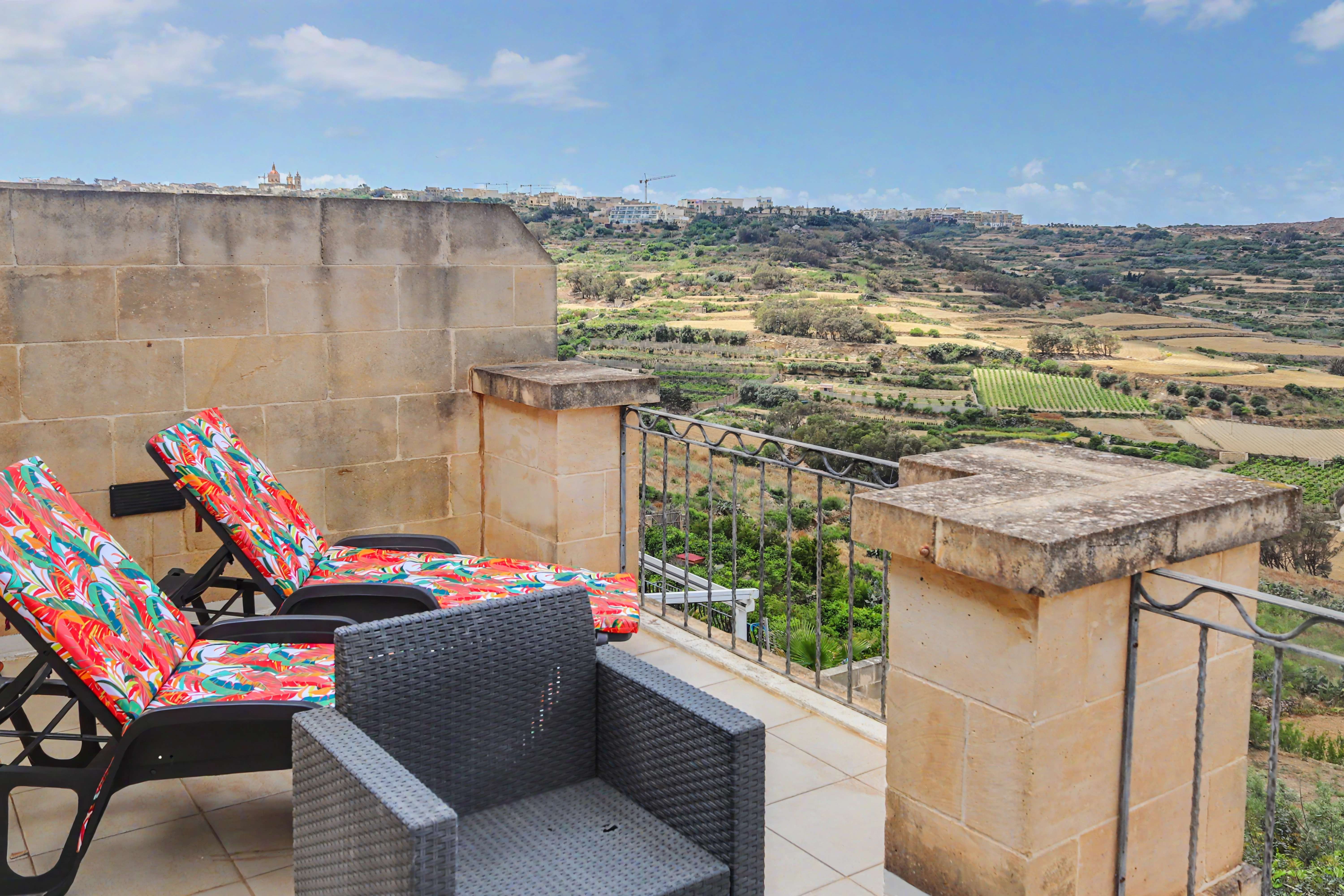 Terrace loungers valley view
