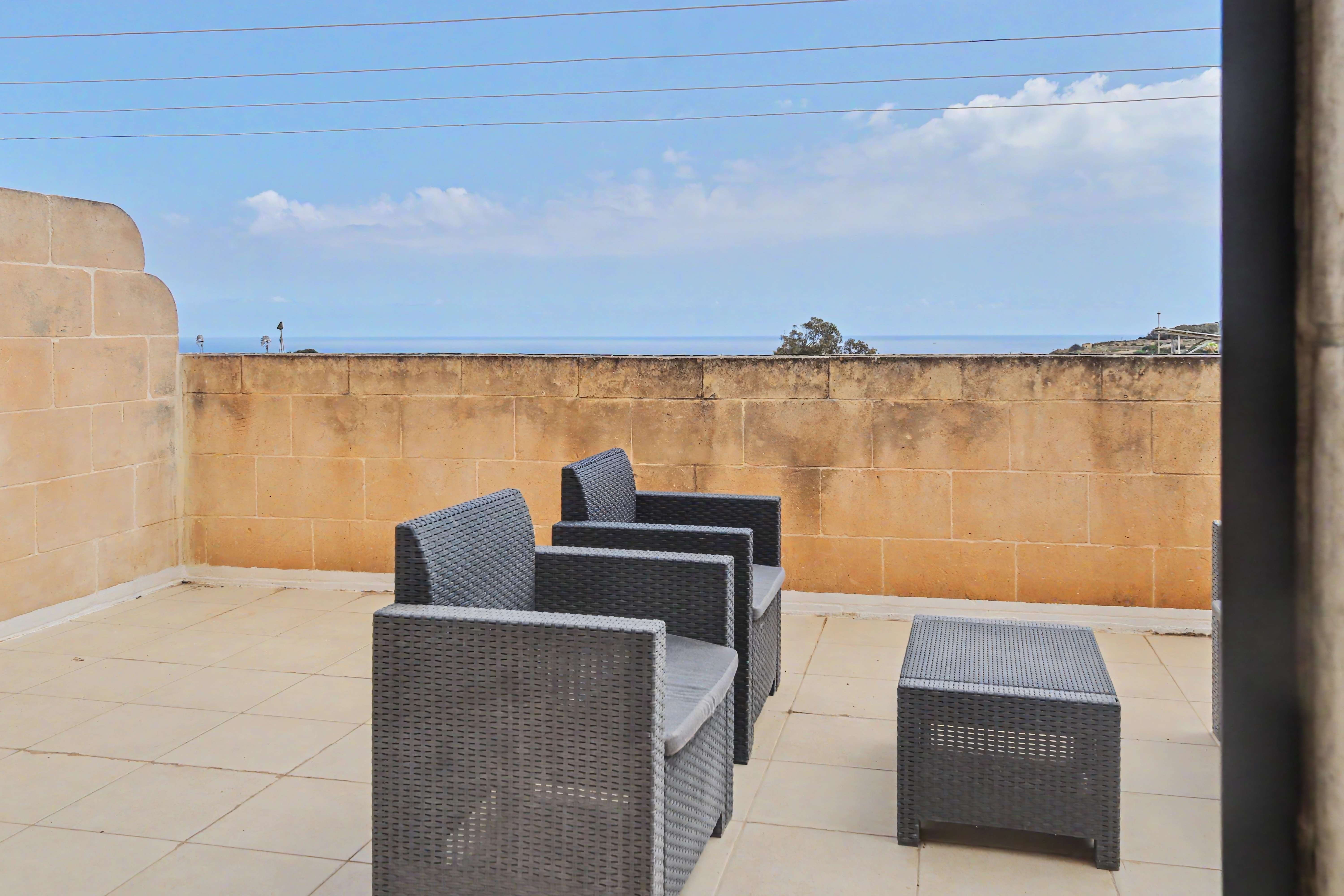 Terrace wicker furniture sea view